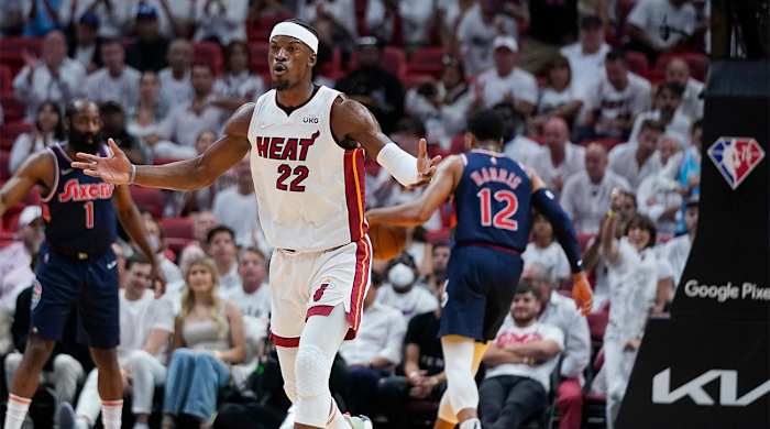 Miami Heat forward Jimmy Butler (22) celebrates after scoring during the first half of Game 5 of an NBA basketball second-round playoff series against the Philadelphia 76ers, Tuesday, May 10, 2022, in Miami.